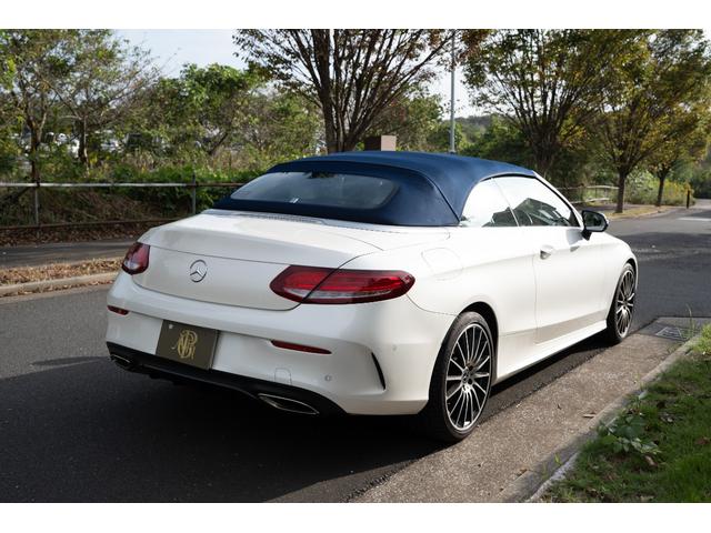 Cクラス C180カブリオレスポーツ AMGライン レザーエクスクルーシブPKG 青幌 ホワイトレザー ワンオーナー 純正HDDナビ フルセグTV バックカメラ ETC ドライブレコーダー(10枚目)