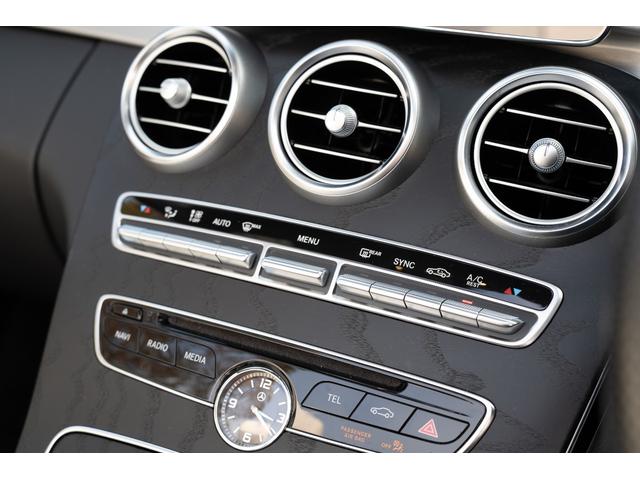 Cクラス C180カブリオレスポーツ AMGライン レザーエクスクルーシブPKG 青幌 ホワイトレザー ワンオーナー 純正HDDナビ フルセグTV バックカメラ ETC ドライブレコーダー(43枚目)