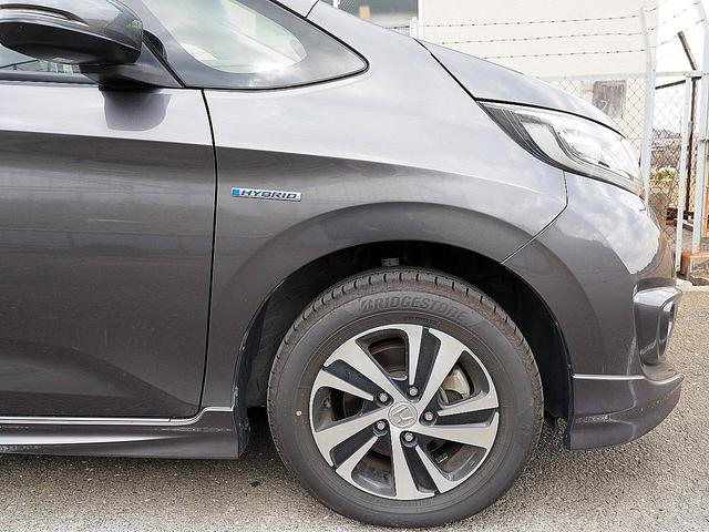 フリードハイブリッド ハイブリッド・Ｇホンダセンシング　４ＷＤ／ホンダセンシング／アダプティブクルーズコントロール／衝突軽減ブレーキ／車線維持支援システム／Ｃ＆Ｓパッケージ／両側パワースライド／ナビＴＶ／リアカメラ／ＥＴＣ／ＬＥＤ／シートヒーター／スマキー（3枚目）