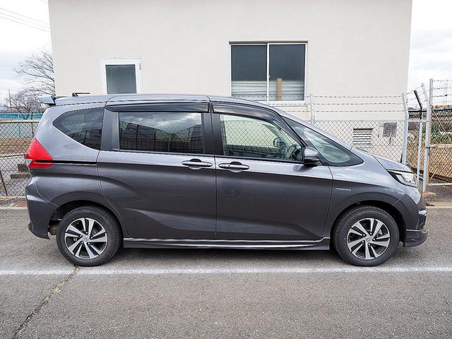 フリードハイブリッド ハイブリッド・Ｇホンダセンシング　４ＷＤ／ホンダセンシング／アダプティブクルーズコントロール／衝突軽減ブレーキ／車線維持支援システム／Ｃ＆Ｓパッケージ／両側パワースライド／ナビＴＶ／リアカメラ／ＥＴＣ／ＬＥＤ／シートヒーター／スマキー（7枚目）