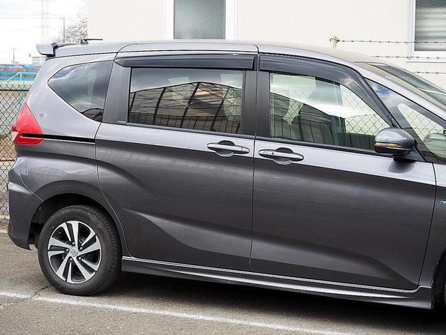 フリードハイブリッド ハイブリッド・Ｇホンダセンシング　４ＷＤ／ホンダセンシング／アダプティブクルーズコントロール／衝突軽減ブレーキ／車線維持支援システム／Ｃ＆Ｓパッケージ／両側パワースライド／ナビＴＶ／リアカメラ／ＥＴＣ／ＬＥＤ／シートヒーター／スマキー（52枚目）