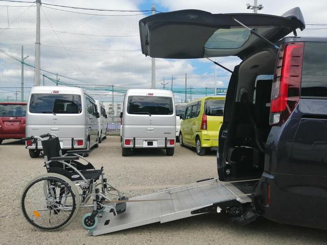 ノア Ｓｉ　車いす仕様車　スロープタイプ　タイプ２　サードシート付　車検２年付　後退防止装置　車いす１名＋５名乗車　通常８名乗車　純正ナビ　バックカメラ　フルセグＴＶ　バックカメラ　フリップダウンモニター　ＥＴＣ　両側パワースライドドア　全国１年保証付き　修復歴無（13枚目）