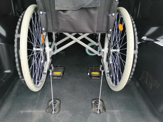 ノア Ｓｉ　車いす仕様車　スロープタイプ　タイプ２　サードシート付　車検２年付　後退防止装置　車いす１名＋５名乗車　通常８名乗車　純正ナビ　バックカメラ　フルセグＴＶ　バックカメラ　フリップダウンモニター　ＥＴＣ　両側パワースライドドア　全国１年保証付き　修復歴無（15枚目）