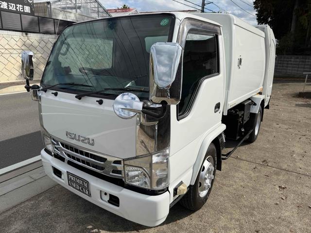 エルフトラック 　フジマイティー　５．１立米　連続巻き込み式パッカー車　６ＭＴ　３．５５ｔ　後輪ダブル　バックカメラ　アイドリングストップ　電動格納ミラー　エアコン　パワーウィンドウ　車検１年付き　ＮＯｘ・ＰＭ適合車（3枚目）