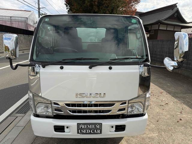 エルフトラック 　フジマイティー　５．１立米　連続巻き込み式パッカー車　６ＭＴ　３．５５ｔ　後輪ダブル　バックカメラ　アイドリングストップ　電動格納ミラー　エアコン　パワーウィンドウ　車検１年付き　ＮＯｘ・ＰＭ適合車（4枚目）