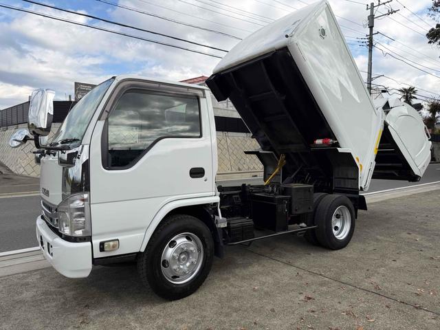 エルフトラック 　フジマイティー　５．１立米　連続巻き込み式パッカー車　６ＭＴ　３．５５ｔ　後輪ダブル　バックカメラ　アイドリングストップ　電動格納ミラー　エアコン　パワーウィンドウ　車検１年付き　ＮＯｘ・ＰＭ適合車（14枚目）