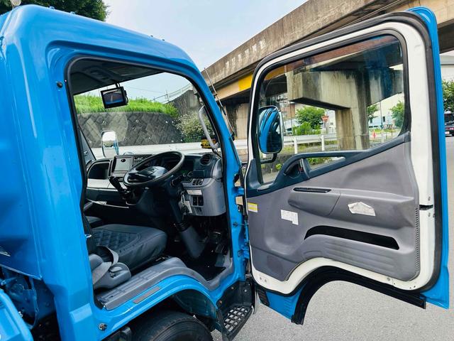 キャンター 　新明和プレス式パッカー車　４．３立米　５ＭＴ　２ｔ　後輪ダブル　キーレスエントリー　ＡＢＳ　ＥＳＣ　バックカメラ　１年車検付き　ＮＯｘ・ＰＭ適合車（11枚目）