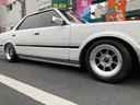 セドリック ブロアム　ターボ　パールホワイト　前後ビッグバンパー　前後車高調　ハヤシレーシング１５インチ　純正改マフラー　ピラーレスハードトップ　ファンシーランプ　字光式３ナンバー（6枚目）