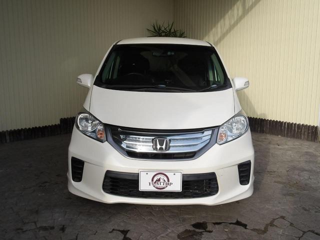 フリードハイブリッド ジャストセレクション　６人乗り／両側電動ドア／ハーフレザーシート／純正アルミホイール／イクリプスナビ／ＴＶ／ＢＴ／バックカメラ／ＥＴＣ／プレミアムホワイト・パール／禁煙車（2枚目）