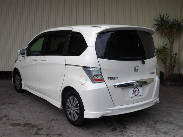 フリードハイブリッド ジャストセレクション　６人乗り／両側電動ドア／ハーフレザーシート／純正アルミホイール／イクリプスナビ／ＴＶ／ＢＴ／バックカメラ／ＥＴＣ／プレミアムホワイト・パール／禁煙車（4枚目）