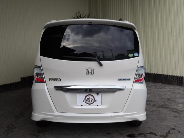 フリードハイブリッド ジャストセレクション　６人乗り／両側電動ドア／ハーフレザーシート／純正アルミホイール／イクリプスナビ／ＴＶ／ＢＴ／バックカメラ／ＥＴＣ／プレミアムホワイト・パール／禁煙車（6枚目）
