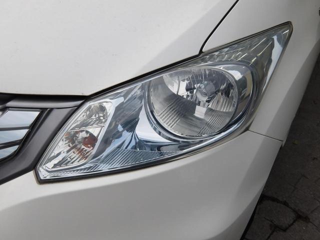 フリードハイブリッド ジャストセレクション　６人乗り／両側電動ドア／ハーフレザーシート／純正アルミホイール／イクリプスナビ／ＴＶ／ＢＴ／バックカメラ／ＥＴＣ／プレミアムホワイト・パール／禁煙車（11枚目）