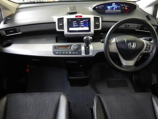 フリードハイブリッド ジャストセレクション　６人乗り／両側電動ドア／ハーフレザーシート／純正アルミホイール／イクリプスナビ／ＴＶ／ＢＴ／バックカメラ／ＥＴＣ／プレミアムホワイト・パール／禁煙車（14枚目）