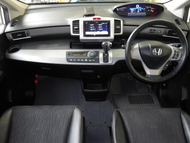 フリードハイブリッド ジャストセレクション　６人乗り／両側電動ドア／ハーフレザーシート／純正アルミホイール／イクリプスナビ／ＴＶ／ＢＴ／バックカメラ／ＥＴＣ／プレミアムホワイト・パール／禁煙車（15枚目）