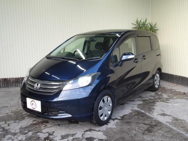 フリード Ｇ　ジャストセレクション　８人乗り／電動スライドドア／純正ナビ／ＴＶ／純正フリップダウンモニター／ＥＴＣ／修復歴無し（3枚目）