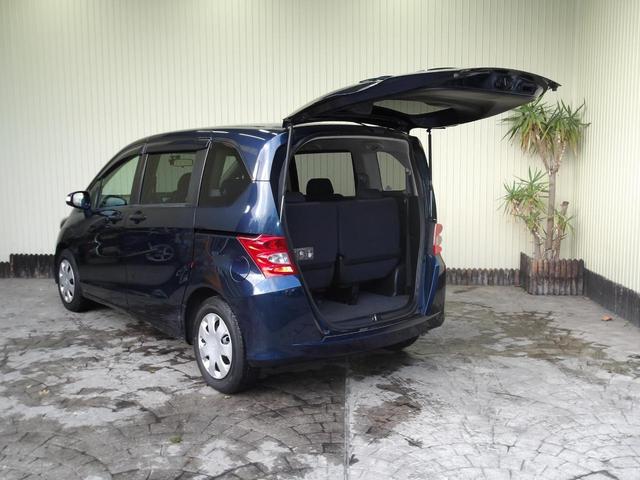 フリード Ｇ　ジャストセレクション　８人乗り／電動スライドドア／純正ナビ／ＴＶ／純正フリップダウンモニター／ＥＴＣ／修復歴無し（5枚目）