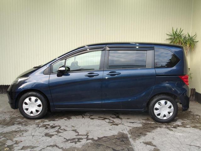 フリード Ｇ　ジャストセレクション　８人乗り／電動スライドドア／純正ナビ／ＴＶ／純正フリップダウンモニター／ＥＴＣ／修復歴無し（9枚目）