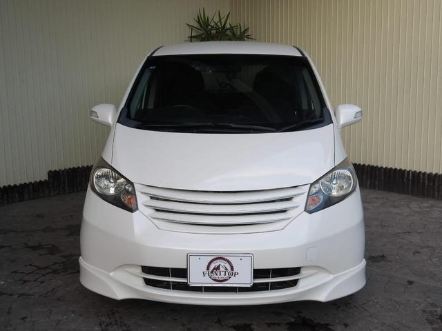 フリード Ｇ　エアロ　ジャストセレクション　２２年１２月登録／純正エアロ／プレミアムホワイト・パール／電動スライドドア／純正ＨＤＤインターナビ／ＴＶ／ＤＶＤビデオ／バックカメラ／ＥＴＣ／７人乗り／禁煙車／修復歴無し（2枚目）