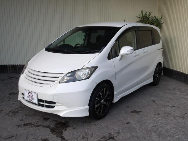 フリード Ｇ　エアロ　ジャストセレクション　２２年１２月登録／純正エアロ／プレミアムホワイト・パール／電動スライドドア／純正ＨＤＤインターナビ／ＴＶ／ＤＶＤビデオ／バックカメラ／ＥＴＣ／７人乗り／禁煙車／修復歴無し（3枚目）