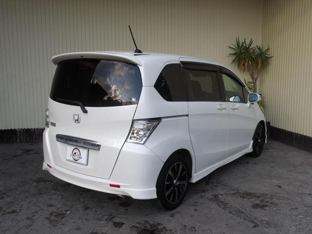 フリード Ｇ　エアロ　ジャストセレクション　２２年１２月登録／純正エアロ／プレミアムホワイト・パール／電動スライドドア／純正ＨＤＤインターナビ／ＴＶ／ＤＶＤビデオ／バックカメラ／ＥＴＣ／７人乗り／禁煙車／修復歴無し（7枚目）