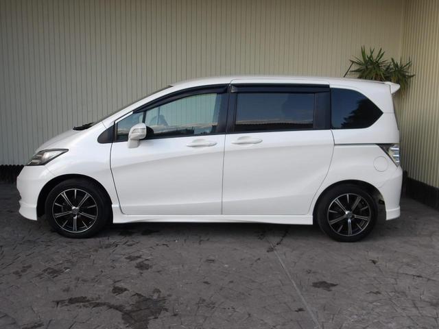 フリード Ｇ　エアロ　ジャストセレクション　２２年１２月登録／純正エアロ／プレミアムホワイト・パール／電動スライドドア／純正ＨＤＤインターナビ／ＴＶ／ＤＶＤビデオ／バックカメラ／ＥＴＣ／７人乗り／禁煙車／修復歴無し（8枚目）