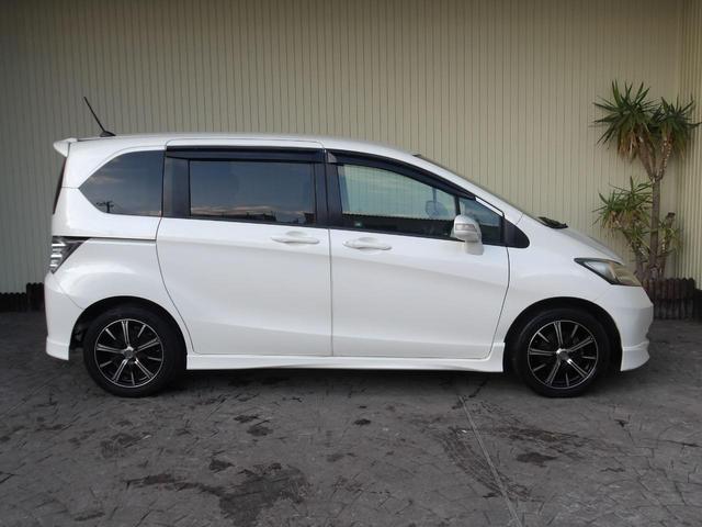 フリード Ｇ　エアロ　ジャストセレクション　２２年１２月登録／純正エアロ／プレミアムホワイト・パール／電動スライドドア／純正ＨＤＤインターナビ／ＴＶ／ＤＶＤビデオ／バックカメラ／ＥＴＣ／７人乗り／禁煙車／修復歴無し（9枚目）