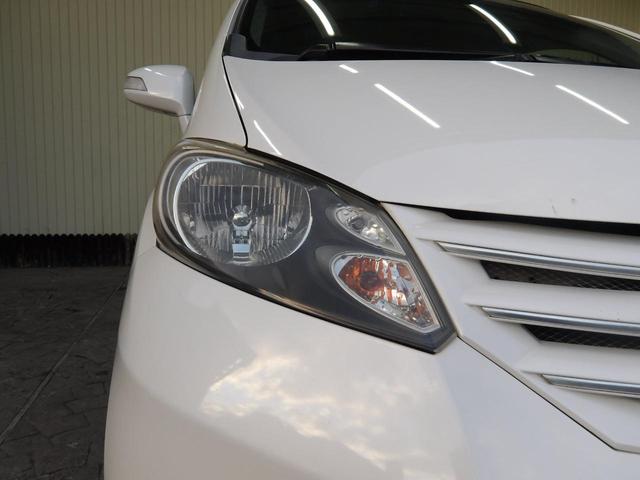 フリード Ｇ　エアロ　ジャストセレクション　２２年１２月登録／純正エアロ／プレミアムホワイト・パール／電動スライドドア／純正ＨＤＤインターナビ／ＴＶ／ＤＶＤビデオ／バックカメラ／ＥＴＣ／７人乗り／禁煙車／修復歴無し（10枚目）