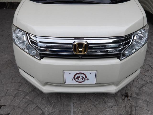 ステップワゴン L Lタイプ/プレミアムヒダマリアイボリーパール/純正HDDインターナビ/TV/DVDビデオ/全方位カメラ/純正フリップダウンモニター/ETC/モデューロアルミホイール/スマートキー/禁煙車/修復歴無し(22枚目)