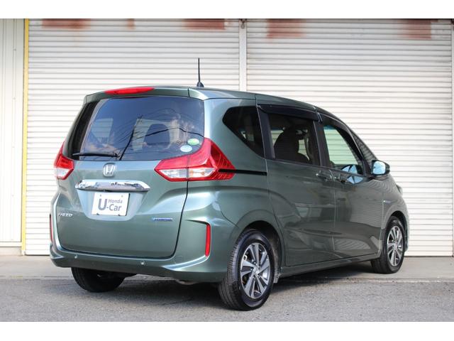 フリードハイブリッド ハイブリッド・Gホンダセンシング 9インチ純正ナビゲーション 前後ドライブレコーダー ETC車載器 LEDヘッドライト HondaSENSING 両側パワースライドドア 15インチアルミホイール 本革巻ステアリングホイール(6枚目)