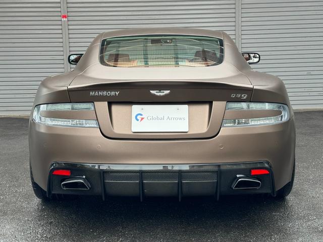 ＤＢ９ クーペ　ＭＡＮＳＯＲＹエアロ　ＭＡＮＳＯＲＹ２０ＡＷ　ＭＡＮＳＯＲＹマフラーカッター　マットブラウンラッピング　社外ナビ　レーダー　オレンジレザー　可変マフラーバルブＳＷ　純正新品ホイールナット　スペアキー（8枚目）