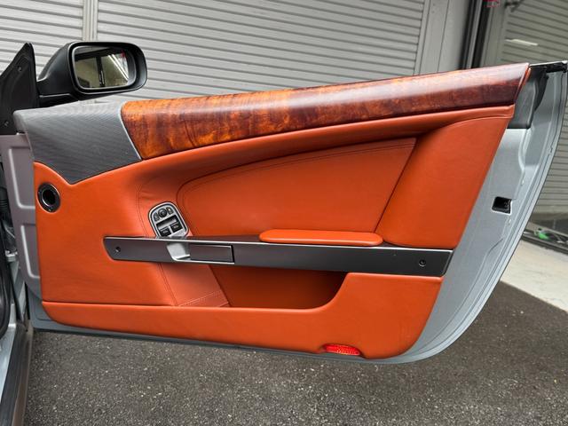 ＤＢ９ クーペ　ＭＡＮＳＯＲＹエアロ　ＭＡＮＳＯＲＹ２０ＡＷ　ＭＡＮＳＯＲＹマフラーカッター　マットブラウンラッピング　社外ナビ　レーダー　オレンジレザー　可変マフラーバルブＳＷ　純正新品ホイールナット　スペアキー（23枚目）