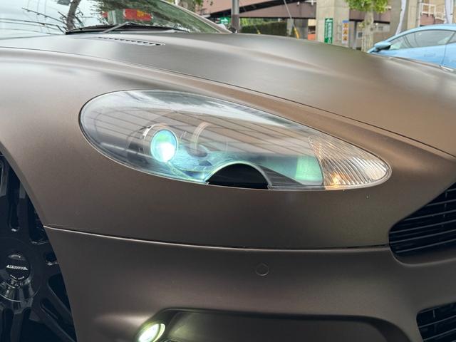 ＤＢ９ クーペ　ＭＡＮＳＯＲＹエアロ　ＭＡＮＳＯＲＹ２０ＡＷ　ＭＡＮＳＯＲＹマフラーカッター　マットブラウンラッピング　社外ナビ　レーダー　オレンジレザー　可変マフラーバルブＳＷ　純正新品ホイールナット　スペアキー（30枚目）