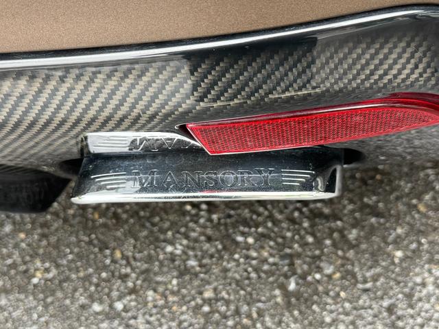 ＤＢ９ クーペ　ＭＡＮＳＯＲＹエアロ　ＭＡＮＳＯＲＹ２０ＡＷ　ＭＡＮＳＯＲＹマフラーカッター　マットブラウンラッピング　社外ナビ　レーダー　オレンジレザー　可変マフラーバルブＳＷ　純正新品ホイールナット　スペアキー（34枚目）