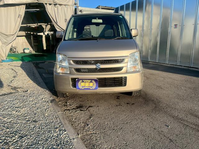 ワゴンＲ ＦＸ　タイミングチェーン　純正ＣＤデッキ　電動格納ミラー　レベライザー　バイザー　ベンチシート　記録簿　社外１５インチアルミホイール　衝突安全ボディ　エアコン　パワーステアリング　パワーウィンドウ（13枚目）