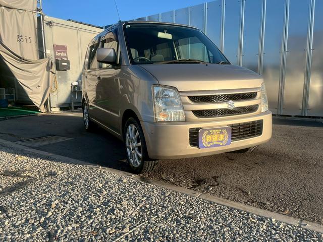 ワゴンＲ ＦＸ　タイミングチェーン　純正ＣＤデッキ　電動格納ミラー　レベライザー　バイザー　ベンチシート　記録簿　社外１５インチアルミホイール　衝突安全ボディ　エアコン　パワーステアリング　パワーウィンドウ（14枚目）