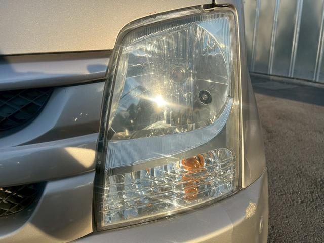 ワゴンＲ ＦＸ　タイミングチェーン　純正ＣＤデッキ　電動格納ミラー　レベライザー　バイザー　ベンチシート　記録簿　社外１５インチアルミホイール　衝突安全ボディ　エアコン　パワーステアリング　パワーウィンドウ（28枚目）