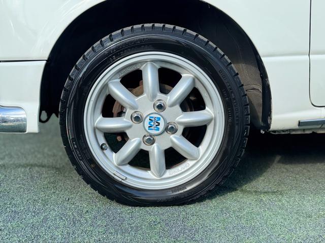 ミラジーノ ミニライトスペシャル　最終型　ブラックウッドインテリア　黒本革巻純正ステアリング　ミニライト１４インチホイール　タイミングベルト　ウォーターポンプ交換済　ＡＣコンプレッサー交換済　ＥＴＣ　純正オーディオ　検Ｒ９年９月（44枚目）