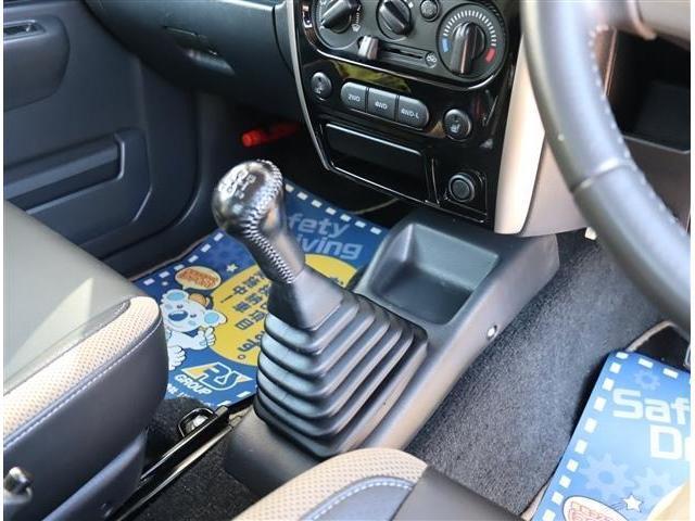 ランドベンチャー 5速マニュアル車 パートタイム4WD ターボ キーレス ETC 専用レザー調シート シートヒーター 16インチAW ルーフキャリア 背面ハードカバー 電動格納ミラー フォグランプ ライトレベライザー(19枚目)