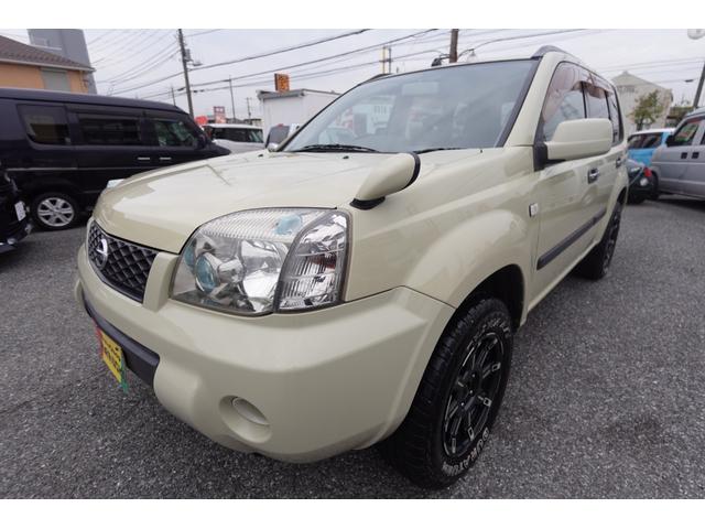 エクストレイル Ｓ　純正５速ＮＴ社外１６インチアルミ純正カラー電動格納ドアミラープライバシーガラスパナソニック製ナビＥＴＣマニュアルエアコンキーレス切替式４ＷＤレザーシート＆防水フロアー修復歴無し記録簿付き２オーナー車（11枚目）