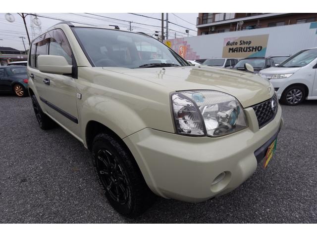 エクストレイル Ｓ　純正５速ＮＴ社外１６インチアルミ純正カラー電動格納ドアミラープライバシーガラスパナソニック製ナビＥＴＣマニュアルエアコンキーレス切替式４ＷＤレザーシート＆防水フロアー修復歴無し記録簿付き２オーナー車（12枚目）