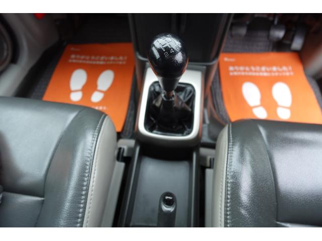 エクストレイル Ｓ　純正５速ＮＴ社外１６インチアルミ純正カラー電動格納ドアミラープライバシーガラスパナソニック製ナビＥＴＣマニュアルエアコンキーレス切替式４ＷＤレザーシート＆防水フロアー修復歴無し記録簿付き２オーナー車（56枚目）