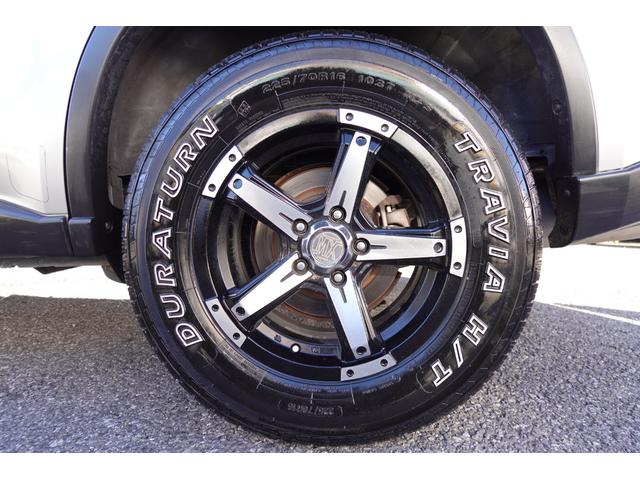 エクストレイル 20X 純正6速MT社外16インチAWレザーシート電動格納ドアミラープライバシーガラスレベライザー純正CDデッキオートエアコン両席AバックABS撥水フロアーリアワイパー修復歴無取説記録簿付走行56940キロ(26枚目)