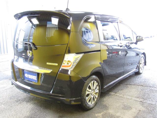 フリードハイブリッド ジャストセレクション　両側オートスライド　ＨＤＤナビ　バックカメラ（11枚目）