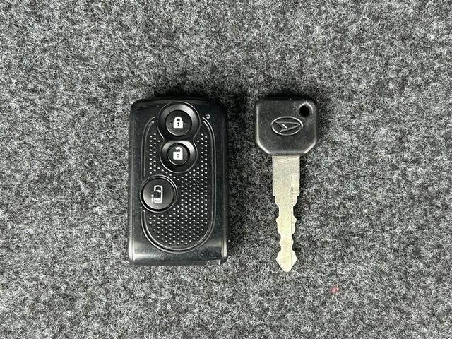 タント Ｘ　スマートセレクションＳＡ　スマートキーシステム　Ｗエアバッグ　横滑り防止　ナビＴＶ　オートエアコン　バックモニター　フルセグテレビ　ＡＵＸ　ＤＶＤ再生可　エアバッグ　ＡＢＳ　キーレス　パワーウインドウ　ベンチシ－ト　メモリナビ（36枚目）
