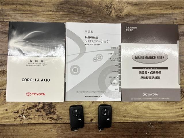 カローラアクシオ １．５Ｇ　ダブルバイビー　衝突回避システム　Ｂカメラ　ワンセグＴＶ　ＬＥＤライト　メモリナビ　オートエアコン　Ｉ－ＳＴＯＰ　スマートキー　盗難防止装置　ナビ＆ＴＶ　エアバッグ　キーレス　横滑り防止機能（20枚目）