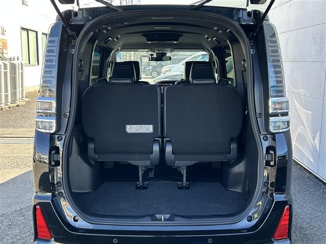 ヴォクシー ZS 煌III プリクラッシュ スマートキ アイスト DVD再生機能 横滑り防止装置 ナビTV アルミ 三列シート 盗難防止 オートエアコン キーレス ETC装備 パワステ メモリナビ クルコン LEDヘッドライト(34枚目)