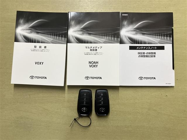 ヴォクシー S-G 点検記録簿付 Rカメラ ミュージックプレイヤー接続可 アルミホイル LEDヘッドランプ 横滑り防止装置 スマートキ キーレスエントリー 3列シート フルセグテレビ ワンオーナー 盗難防止システム TV(25枚目)