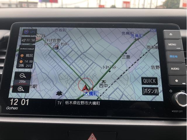 フィット ｅ：ＨＥＶリュクス　メーカー９型ナビ／地デジ／バックカメラ／ホンダセンシング／シートヒーター／ハーフレザー／ＬＥＤヘッドライト／ＥＴＣ／レーダークルーズコントロール／純正１６インチＡＷ（3枚目）