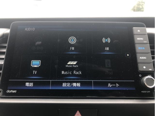 フィット ｅ：ＨＥＶリュクス　メーカー９型ナビ／地デジ／バックカメラ／ホンダセンシング／シートヒーター／ハーフレザー／ＬＥＤヘッドライト／ＥＴＣ／レーダークルーズコントロール／純正１６インチＡＷ（4枚目）