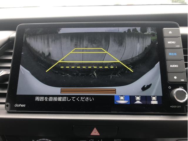 フィット ｅ：ＨＥＶリュクス　メーカー９型ナビ／地デジ／バックカメラ／ホンダセンシング／シートヒーター／ハーフレザー／ＬＥＤヘッドライト／ＥＴＣ／レーダークルーズコントロール／純正１６インチＡＷ（5枚目）